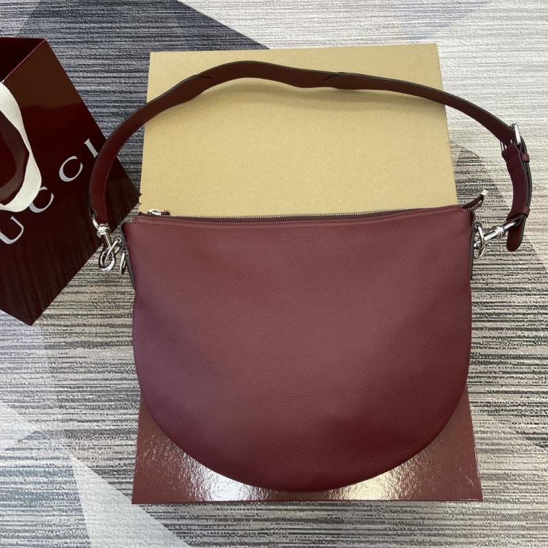 G*u*i top handle bags